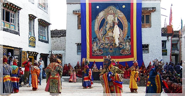 Tibetan monks performing a ritual dance during the Tiji Festival